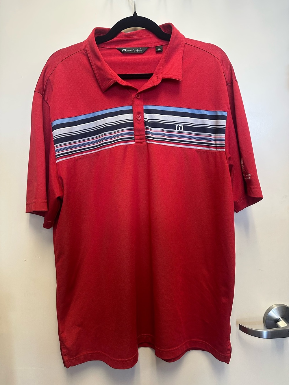 Travis Mathew Red Polo with Blue, White and Black Chest Stripe
